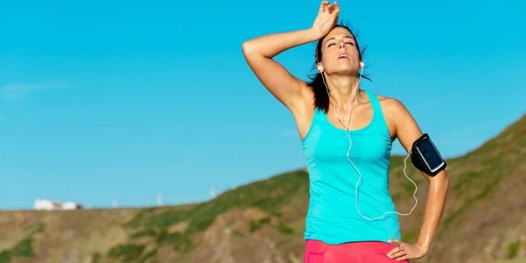 woman sweating after running